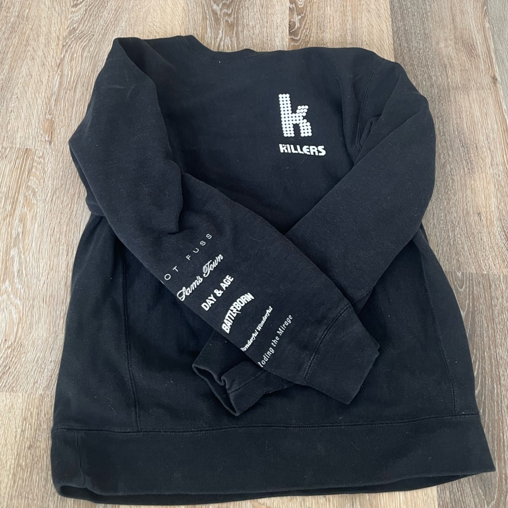 The Killers band merch sweatshirt, albums on sleeve